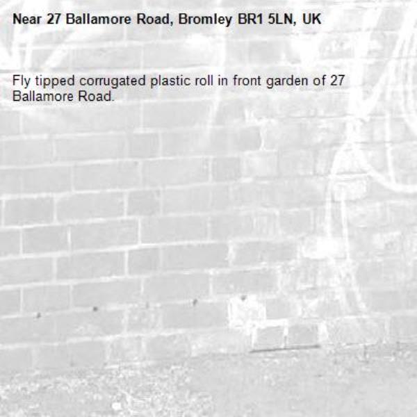 Fly tipped corrugated plastic roll in front garden of 27 Ballamore Road.-27 Ballamore Road, Bromley BR1 5LN, UK