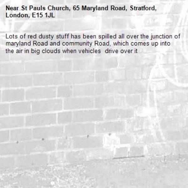Lots of red dusty stuff has been spilled all over the junction of maryland Road and community Road, which comes up into the air in big clouds when vehicles  drive over it -St Pauls Church, 65 Maryland Road, Stratford, London, E15 1JL