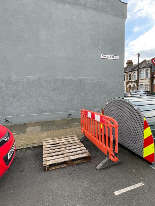 Corner of gower Road and Wyatt Road - pallet and plastic barriers left on road -40 Wyatt Road, Forest Gate, London, E7 9NE