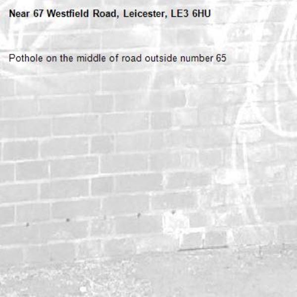 Pothole on the middle of road outside number 65-67 Westfield Road, Leicester, LE3 6HU