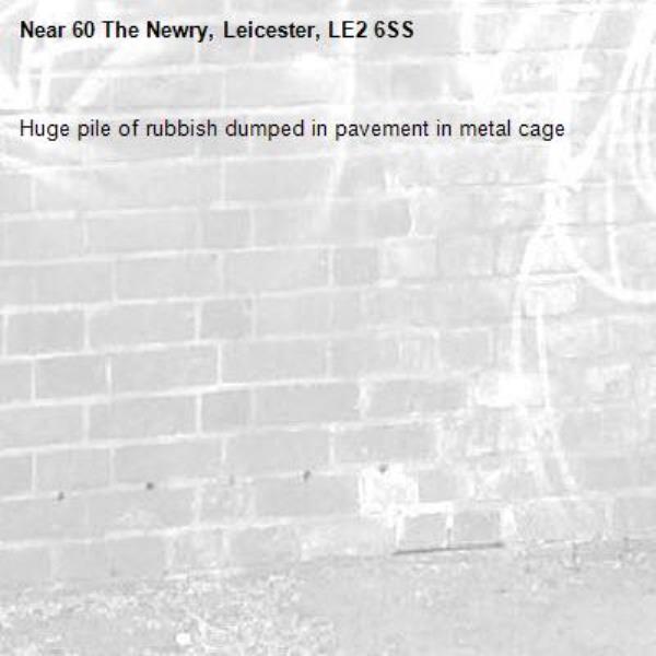 Huge pile of rubbish dumped in pavement in metal cage -60 The Newry, Leicester, LE2 6SS