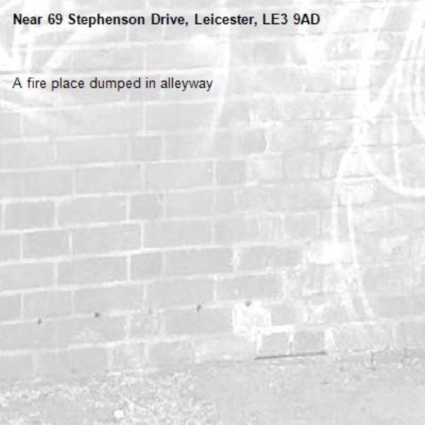 A fire place dumped in alleyway -69 Stephenson Drive, Leicester, LE3 9AD