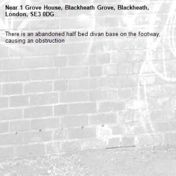 There is an abandoned half bed divan base on the footway, causing an obstruction-1 Grove House, Blackheath Grove, Blackheath, London, SE3 0DG