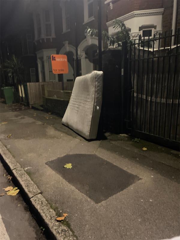 Mattress dumped on pavemenyt-82 Neville Road, Forest Gate, London, E7 9QX