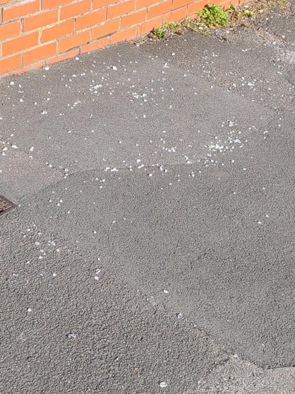 Scattered broken glass on the pavement, unsafe for cyclists.-18 Parker Drive, Leicester, LE4 0JD