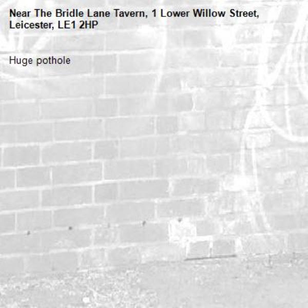 Huge pothole-The Bridle Lane Tavern, 1 Lower Willow Street, Leicester, LE1 2HP