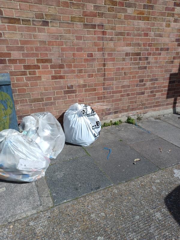 Household waste fly tipped at junction of 23 Westbury Road and St John's Terrace, E7. -23 Westbury Road, Forest Gate, London, E7 8BU