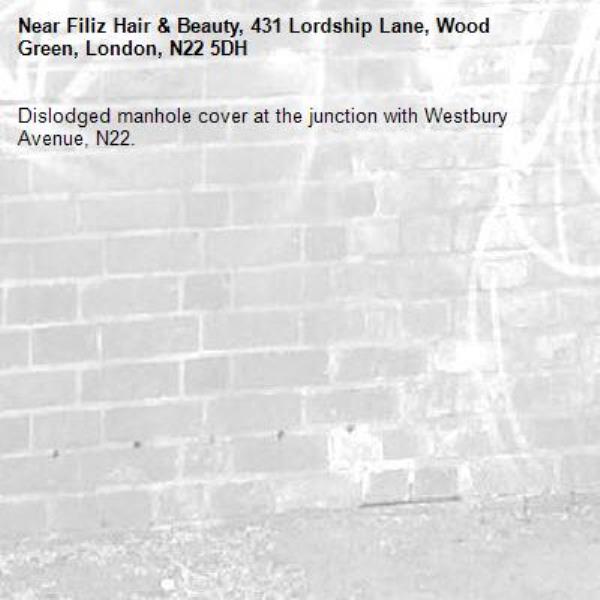 Dislodged manhole cover at the junction with Westbury Avenue, N22.-Filiz Hair &amp; Beauty, 431 Lordship Lane, Wood Green, London, N22 5DH
