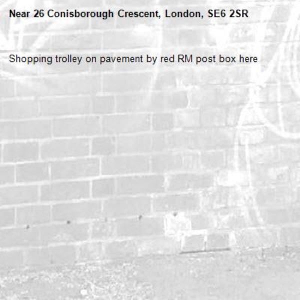 Shopping trolley on pavement by red RM post box here-26 Conisborough Crescent, London, SE6 2SR