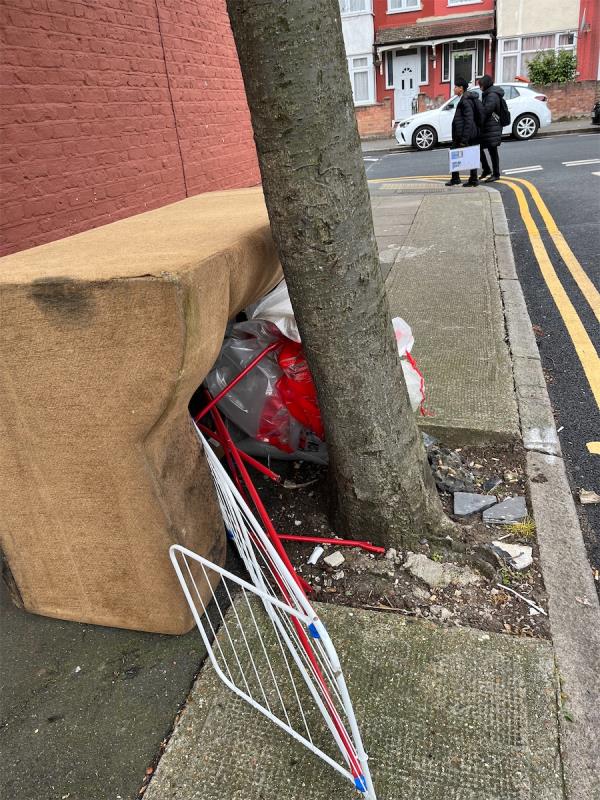 Sofa and laundry stand and plastic bags dumped on pavement-4 Langdon Road, East Ham, London, E6 2QB