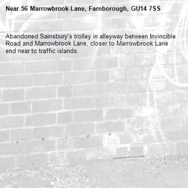 Abandoned Sainsbury's trolley in alleyway between Invincible Road and Marrowbrook Lane, closer to Marrowbrook Lane end near to traffic islands.-56 Marrowbrook Lane, Farnborough, GU14 7SS