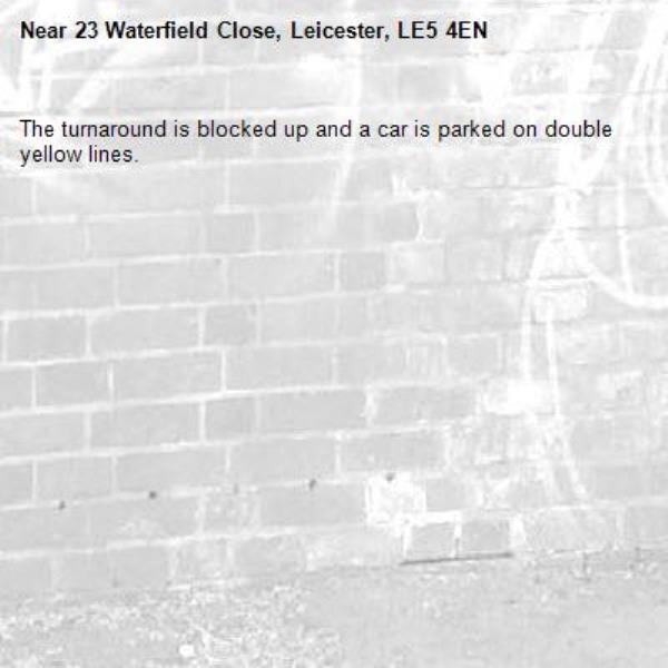 The turnaround is blocked up and a car is parked on double yellow lines.-23 Waterfield Close, Leicester, LE5 4EN