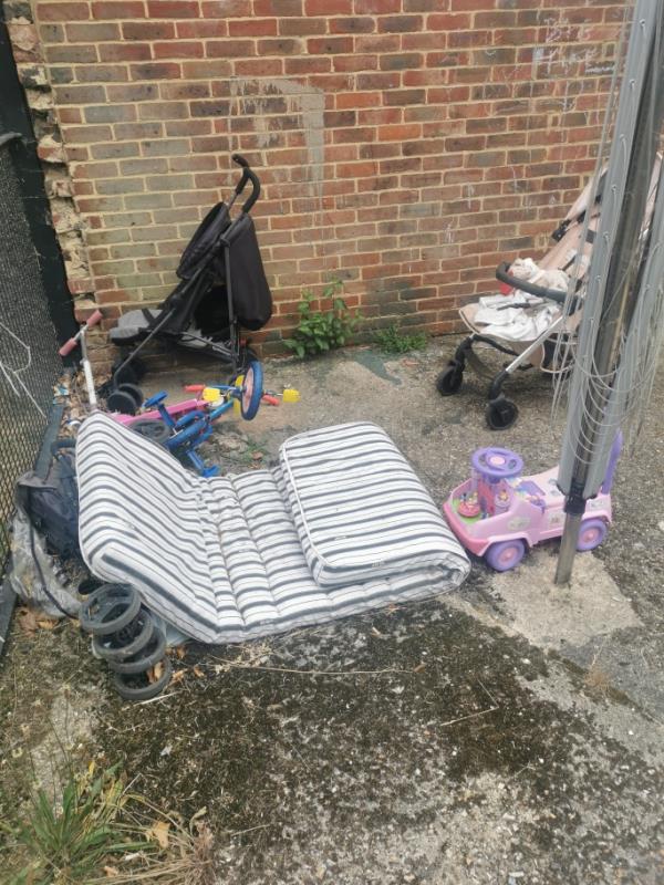 Clear communal garden of old toys, buggies and any other rubbish.. Tenants have sheds to store stuff in and some of these items haven't moved since I started in December -52 Lesford Road, Reading, RG1 6DX
