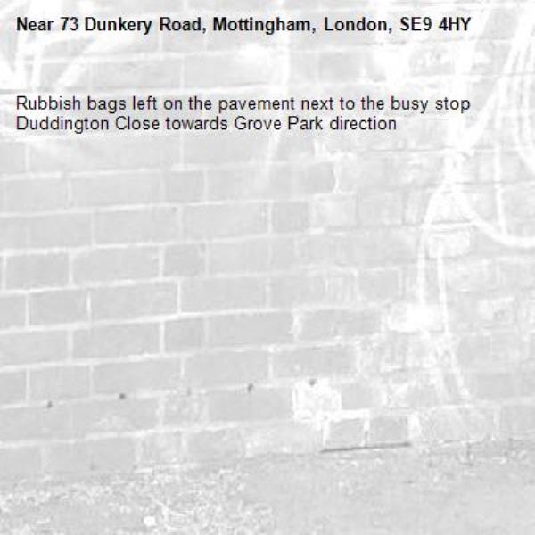 Rubbish bags left on the pavement next to the busy stop Duddington Close towards Grove Park direction -73 Dunkery Road, Mottingham, London, SE9 4HY