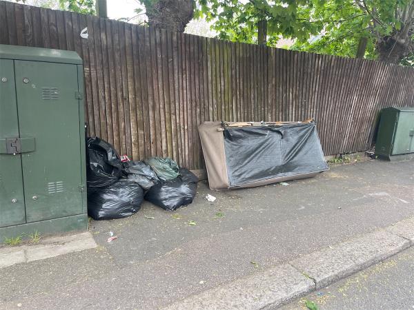 Bed base and 5+ black bags filled with heavy looking waste to please be removed-141 Hazelbank Road, London, SE6 1LT