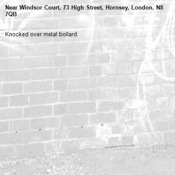 Knocked over metal bollard.-Windsor Court, 73 High Street, Hornsey, London, N8 7QB