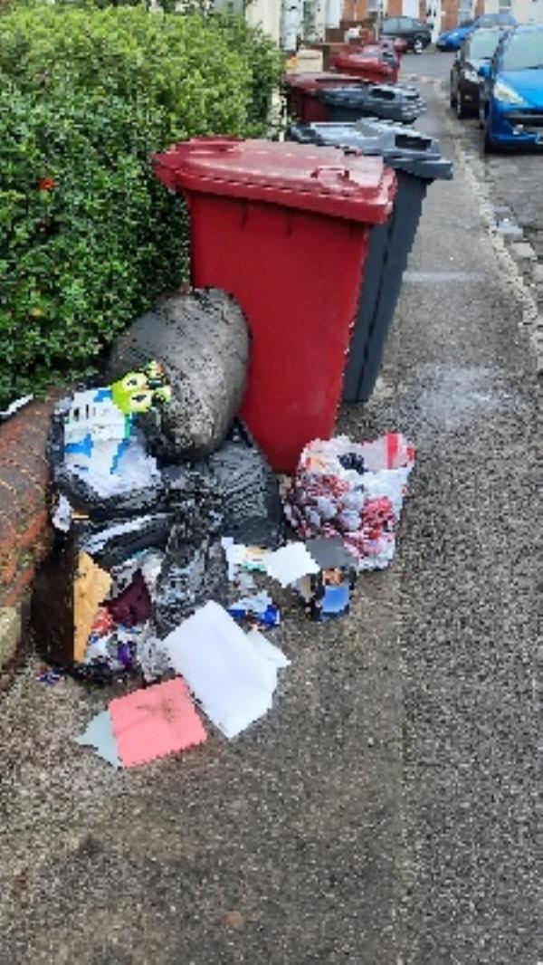 pile of rubbish bags on pavement -40 Gower Street, Reading, RG1 7PE