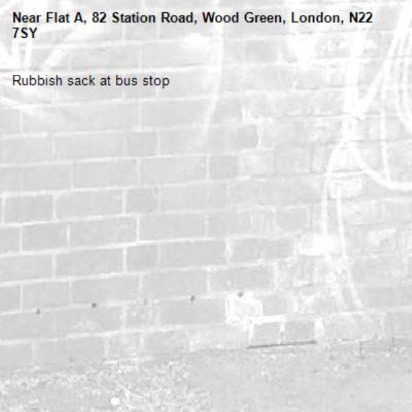 Rubbish sack at bus stop-Flat A, 82 Station Road, Wood Green, London, N22 7SY