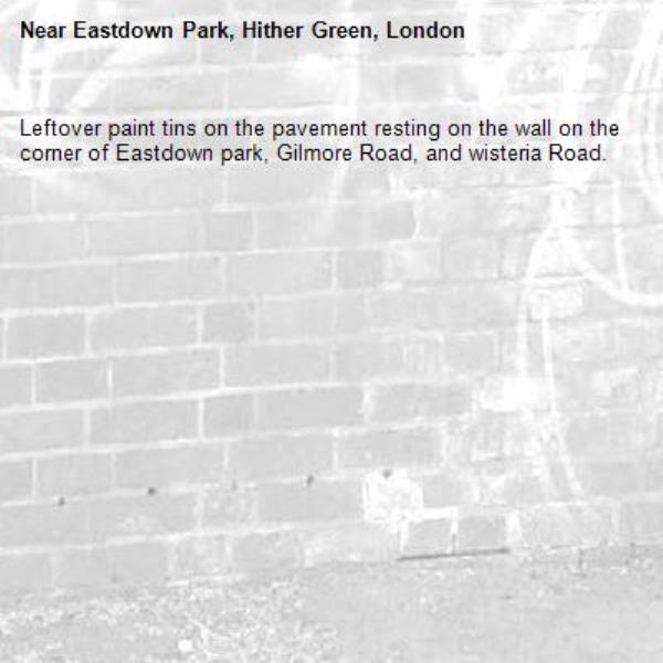 Leftover paint tins on the pavement resting on the wall on the corner of Eastdown park, Gilmore Road, and wisteria Road.  -Eastdown Park, Hither Green, London