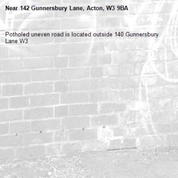 Potholed uneven road is located outside 140 Gunnersbury Lane W3 -142 Gunnersbury Lane, Acton, W3 9BA