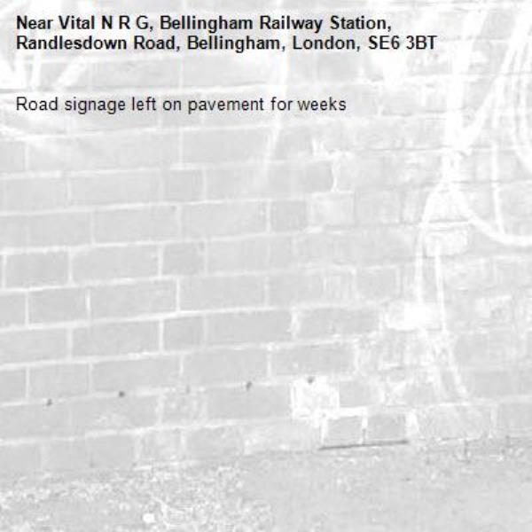 Road signage left on pavement for weeks -Vital N R G, Bellingham Railway Station, Randlesdown Road, Bellingham, London, SE6 3BT