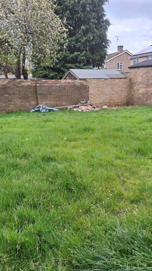 They repaired the wall but didn't take away the rubbish.  6 weeks it's been there now!-15 Tweed Close, Farnborough, GU14 9NF