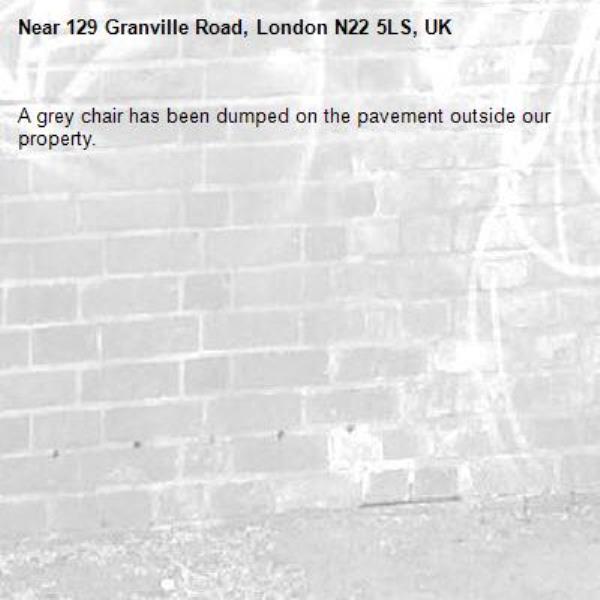 A grey chair has been dumped on the pavement outside our property.-129 Granville Road, London N22 5LS, UK