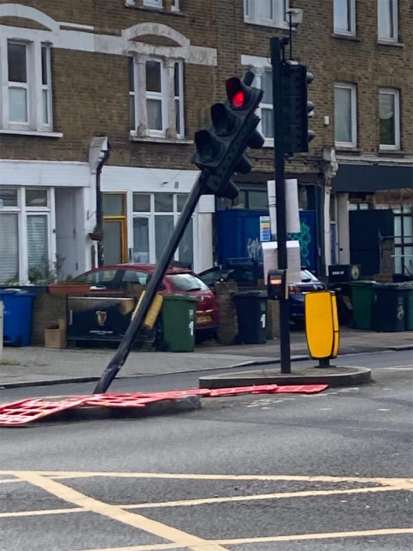 Traffic Lights outside King Alfred pub Sydenham. The traffic lights at this location has been hit by a motor vehicle so is not working and “hanging over”. This happened a number of weeks ago. Please could you arrange to inspect and repair before it causes another accident. Many thanks. -2 Kent House Road, Bromley, SE26 5LB