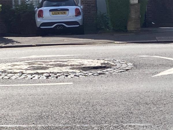 Damaged raised roundabout -Ashbourne Road, Ealing