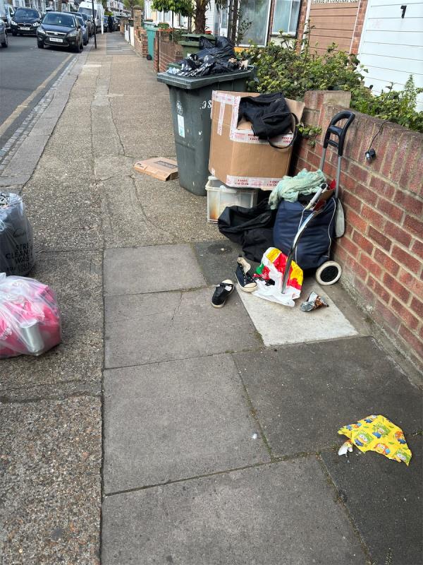 Unwanted household rubbish dumped outside 77 Sibley grove. Restricting access to pavement. -81 Sibley Grove, Manor Park, London, E12 6SD