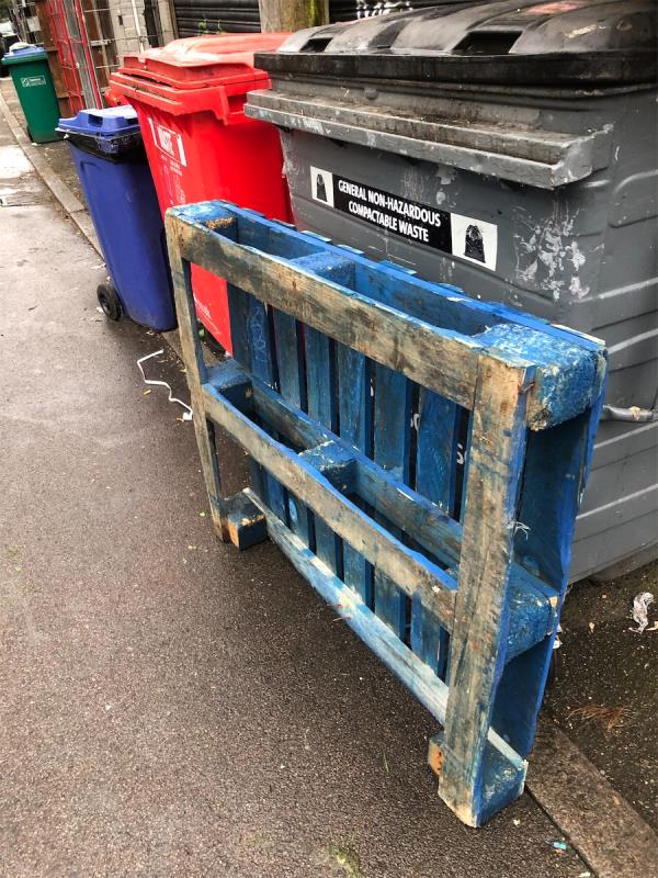 Please clear a pallet from rear of  business in Oakridge Lane-433A, Bromley Road, London, BR1 4PH