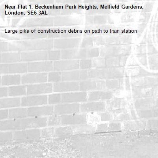 Large pike of construction debris on path to train station-Flat 1, Beckenham Park Heights, Melfield Gardens, London, SE6 3AL