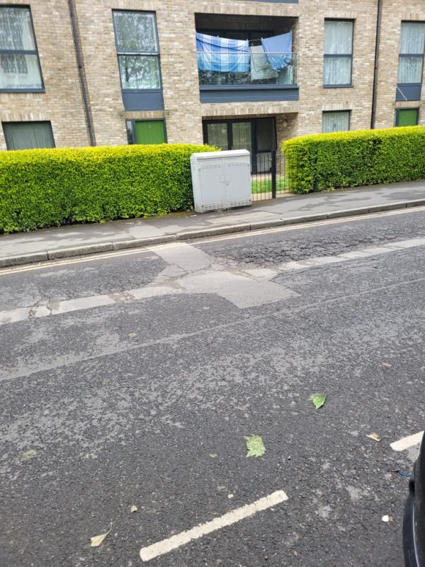 pothole, 
if not sinkhole, 
developing in Tarling Road E16 1GX. 
(bus route)-Quayside House, 119 Tarling Road, Canning Town, London, E16 1GX