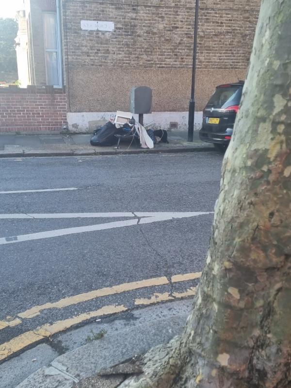 Rubbish dumped on corner-Edwin House, Samson Street, Plaistow, London, E13 9EJ