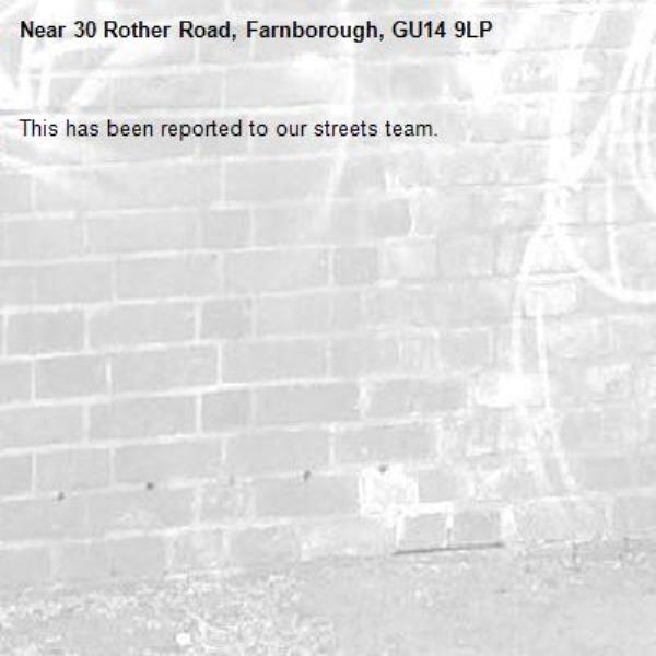 This has been reported to our streets team.-30 Rother Road, Farnborough, GU14 9LP