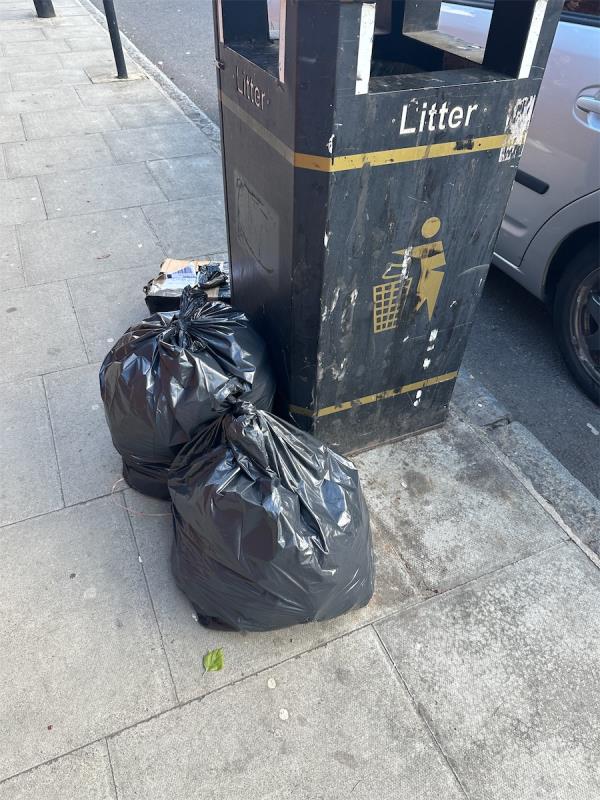 Tipped bags and box-111A, Leytonstone Road, Stratford, London, E15 1JA