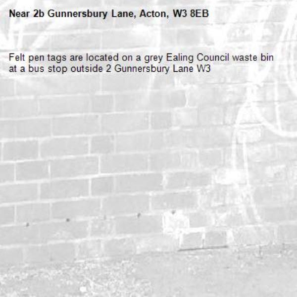 Felt pen tags are located on a grey Ealing Council waste bin at a bus stop outside 2 Gunnersbury Lane W3-2b Gunnersbury Lane, Acton, W3 8EB