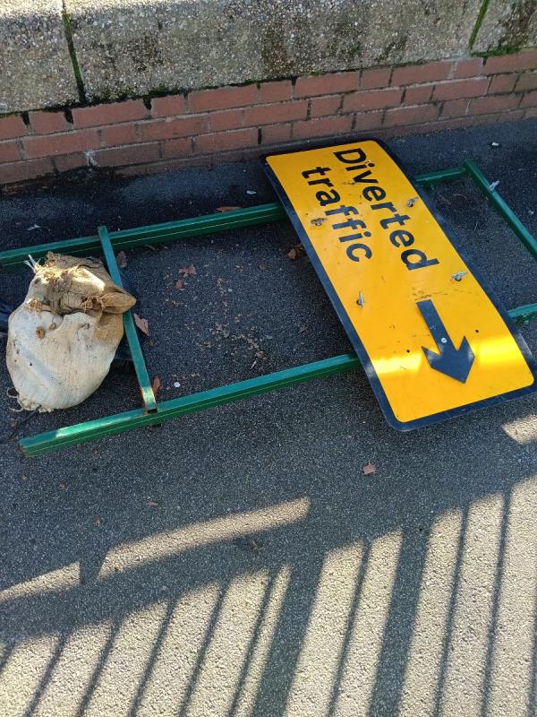 Diverted traffic sign left on pavement -95 Ham Park Road, Stratford, London, E15 4AD
