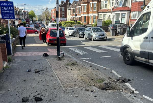 Broken bollard due to traffic accident-First Floor Flat, 45 Colney Hatch Lane, Hornsey, London, N10 1LJ