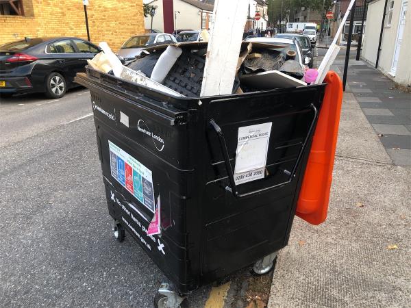 Dumped commercial waste bin -99A, Neville Road, Forest Gate, London, E7 9QS