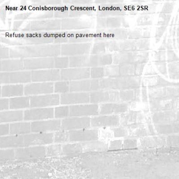 Refuse sacks dumped on pavement here -24 Conisborough Crescent, London, SE6 2SR