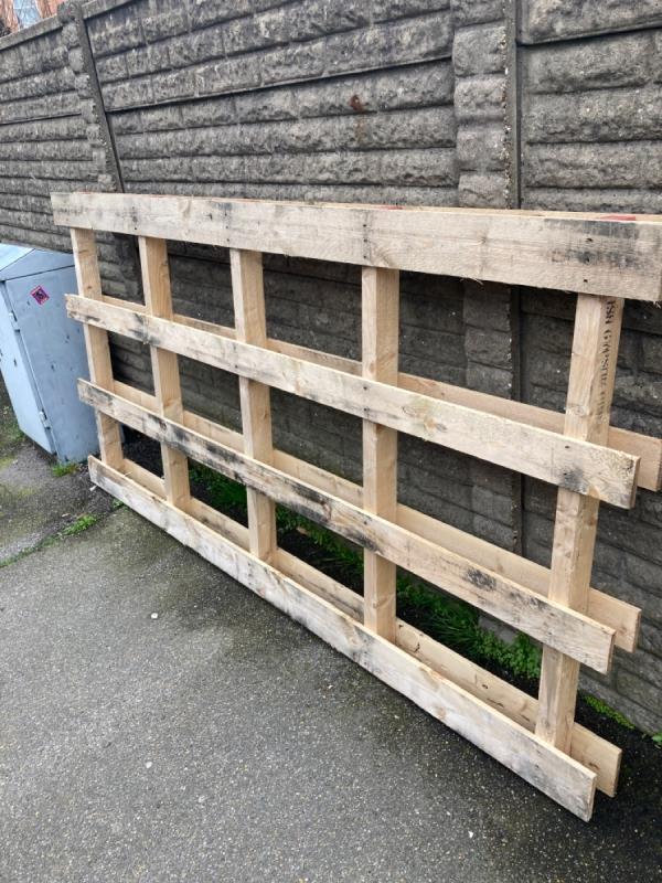 A wooden pallet has been dumped -1 Waterside Court, Weardale Road, London, SE13 5PZ