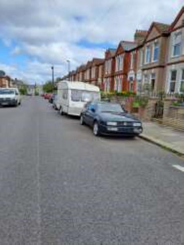 The car has been parked outside no. 33 Balloch Road for several months without number plates. About two weeks ago a caravan (previously parked on Abbotshall Road) was towed to the site and hitched up to the car in the attached picture.
Reported via Fix My Street-33 Balloch Roqad SE6
