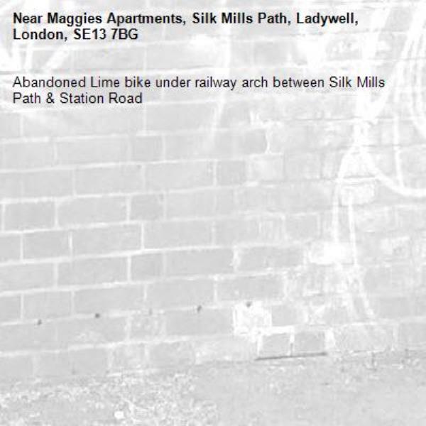 Abandoned Lime bike under railway arch between Silk Mills Path & Station Road-Maggies Apartments, Silk Mills Path, Ladywell, London, SE13 7BG