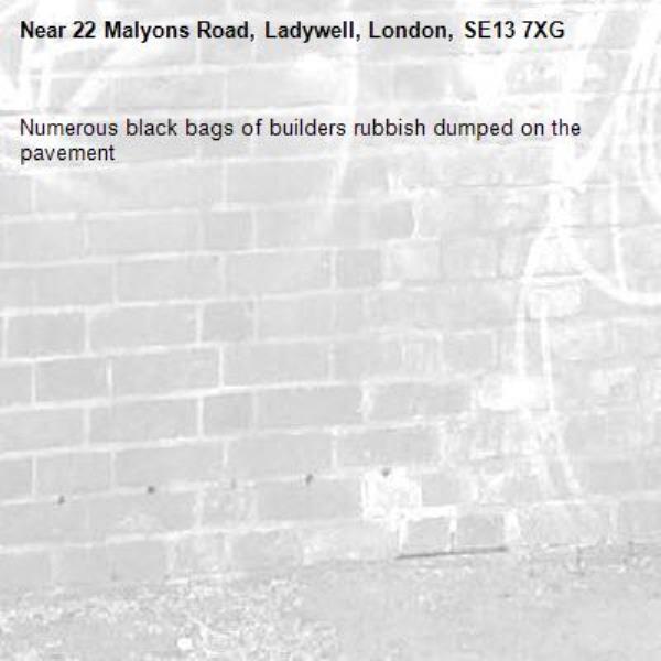 Numerous black bags of builders rubbish dumped on the pavement -22 Malyons Road, Ladywell, London, SE13 7XG