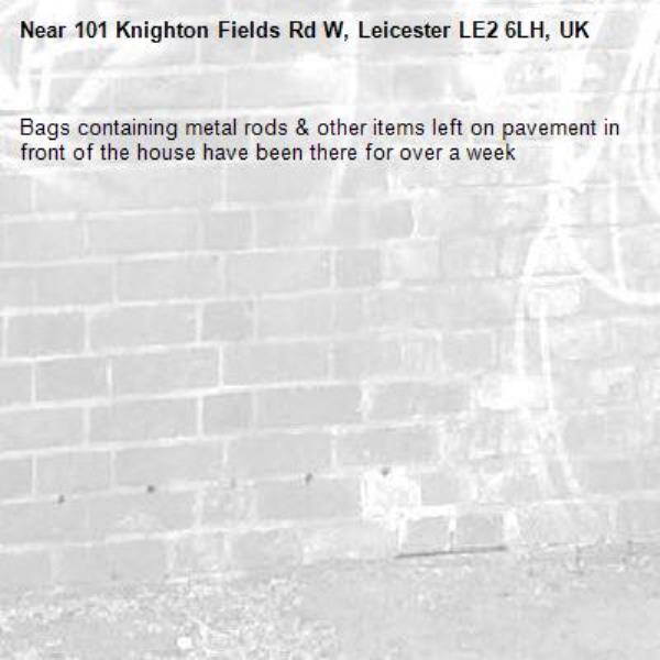 Bags containing metal rods &amp; other items left on pavement in front of the house have been there for over a week -101 Knighton Fields Rd W, Leicester LE2 6LH, UK