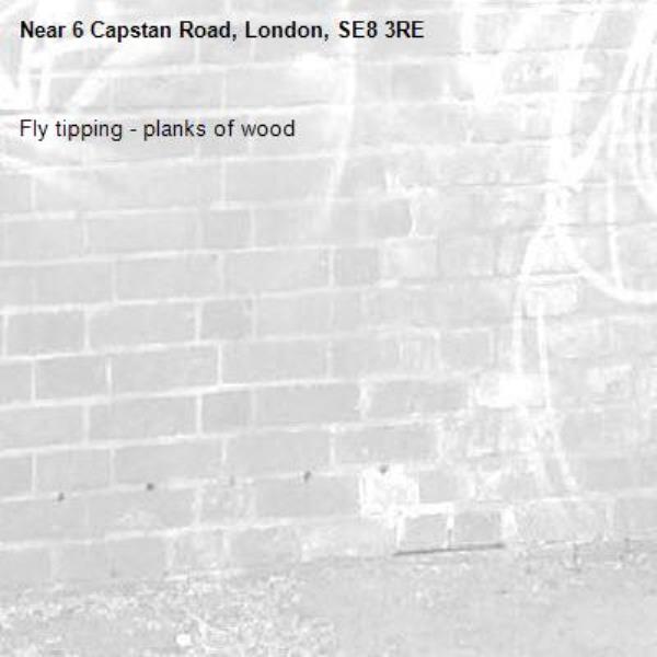 Fly tipping - planks of wood -6 Capstan Road, London, SE8 3RE