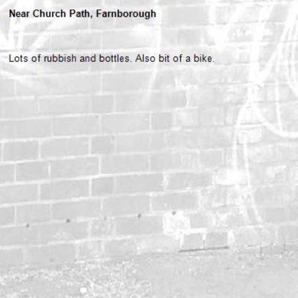 Lots of rubbish and bottles. Also bit of a bike.-Church Path, Farnborough