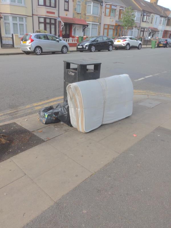 Mattress and rubbish bags dumped outside laundrette on the corner of Mafeking Ave and Central Park rd-147a Central Park Road, East Ham, E6 3DJ