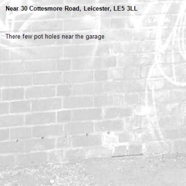 There few pot holes near the garage-30 Cottesmore Road, Leicester, LE5 3LL